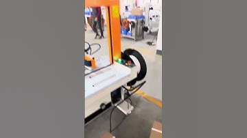 Automatic carton sealer with PP band strapping machine . #machine #packing #factory #carton #straps