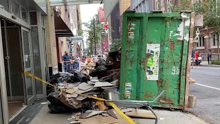 **GIANT DUMPSTER OVERTURNS**  DUMPSTER FALLS OF ROLL OFF TRUCK PICKING IT UP & UPRIGHT OPERATIONS.