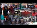 Street food in east africas biggest street market owino market in central uganda  kampala city