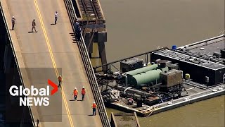 Barge crashes into Galveston bridge, spilling oil into river