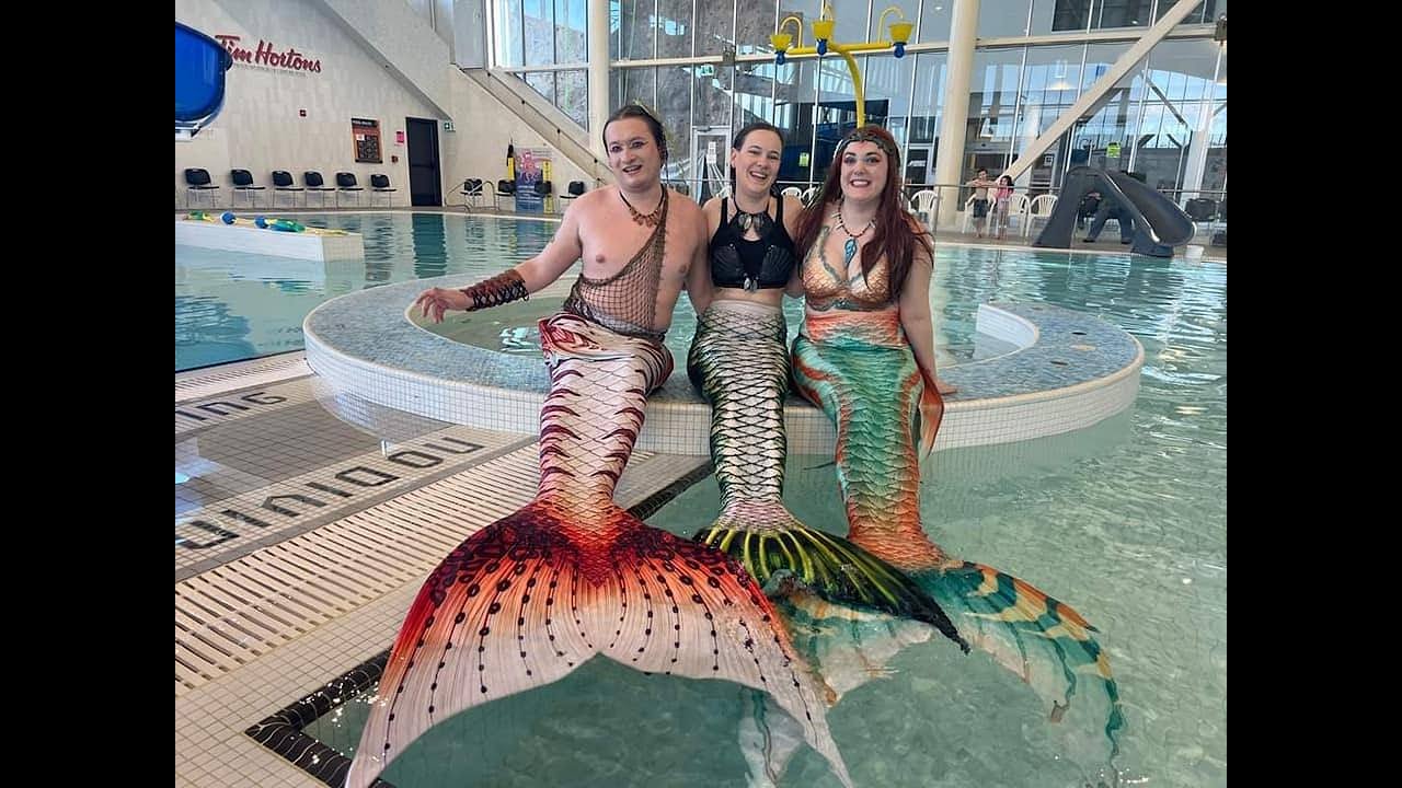 Halifax Mermaid Team Entertains at the Pool
