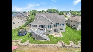 Lakefront home for sale $390,000: 7027 Windrift Ave SW, Byron Center, MI 49315