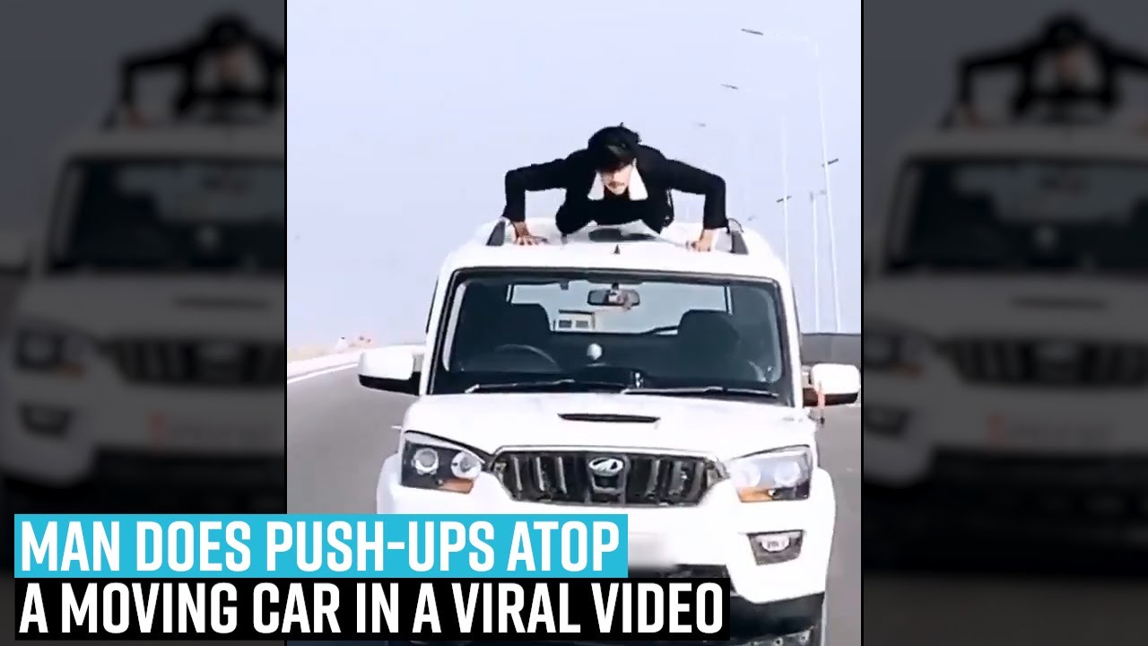 Man does push-ups atop moving car, here's what UP Police rewarded him | Watch