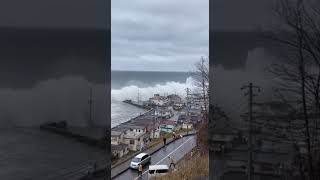 Huge waves crash into coastline - AI generated