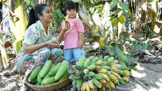 Cute girl Siv chhee help Mom to collect vegetable for cooking - Country family food cooking