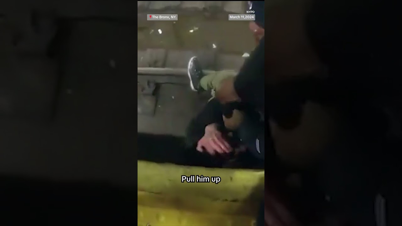 NYPD officers save man who fell onto train tracks NYPD officers save man who fell onto train tracks