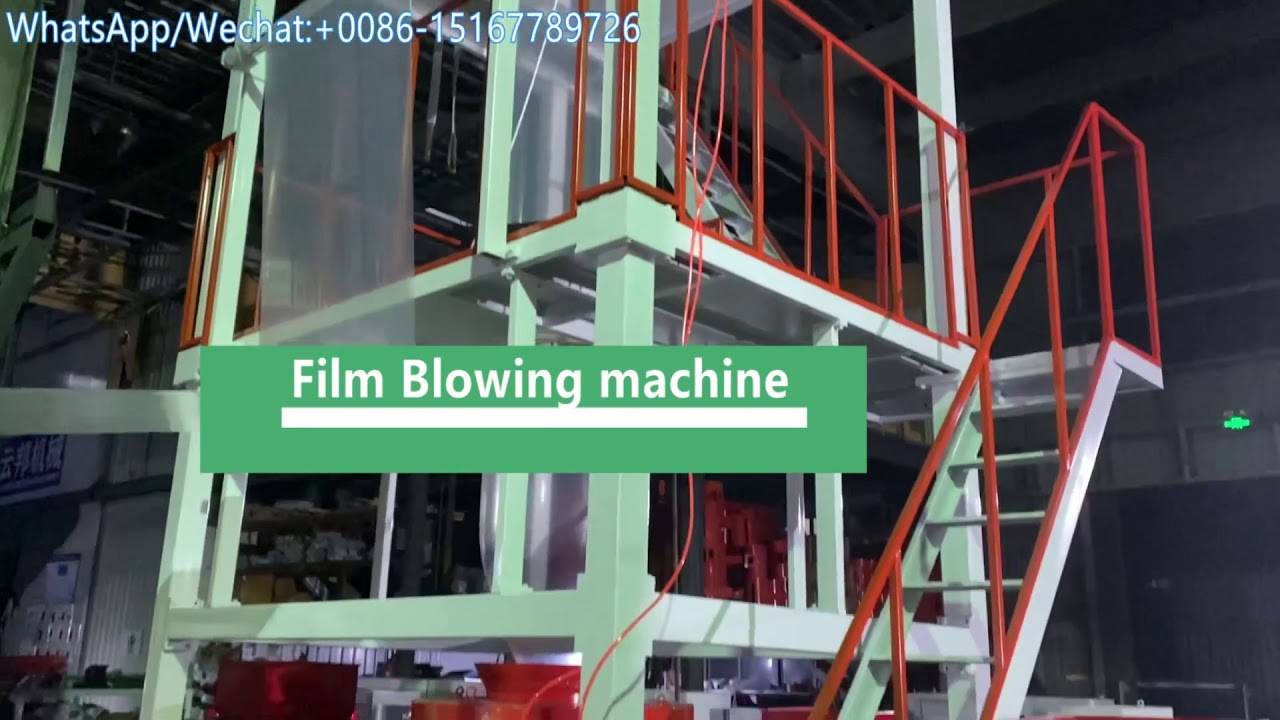 Three layer foil blowing machine with automatic double rewinder