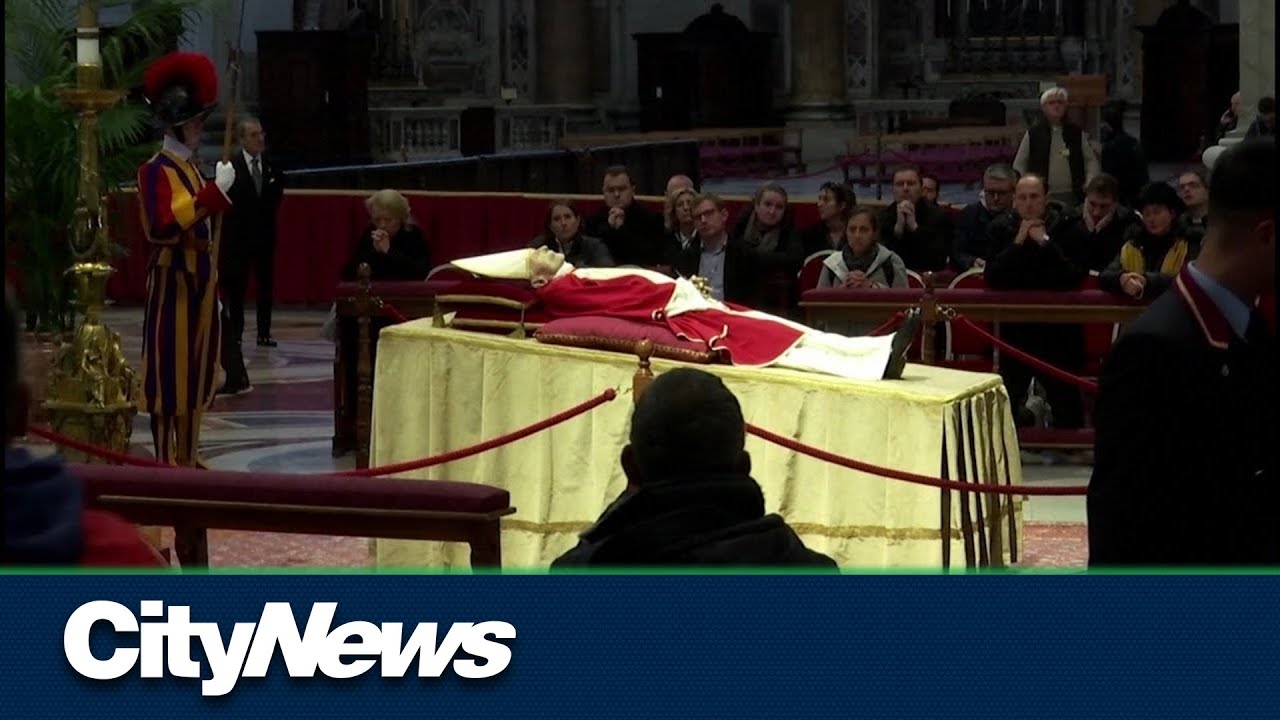 ⁣Thousands view body of former Pope Benedict