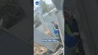 Builders demolishes toilet unaware that fellow worker is inside