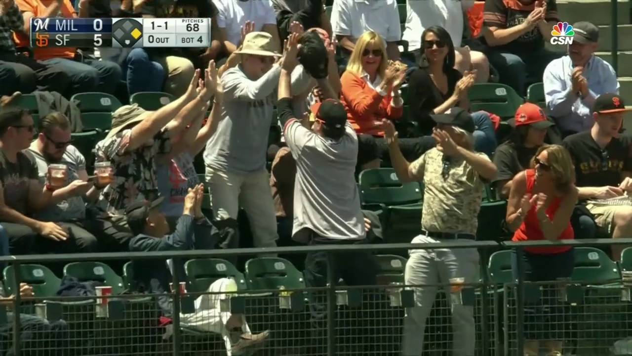 Giants fan gives foul ball to kid and receives a hug YouTube