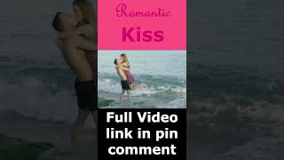 Romantic Kiss At Beach