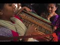 Girls singing, playing instruments on train in India