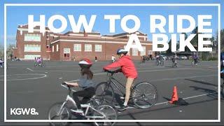 Portland elementary school students learn how to ride a bike in PE class