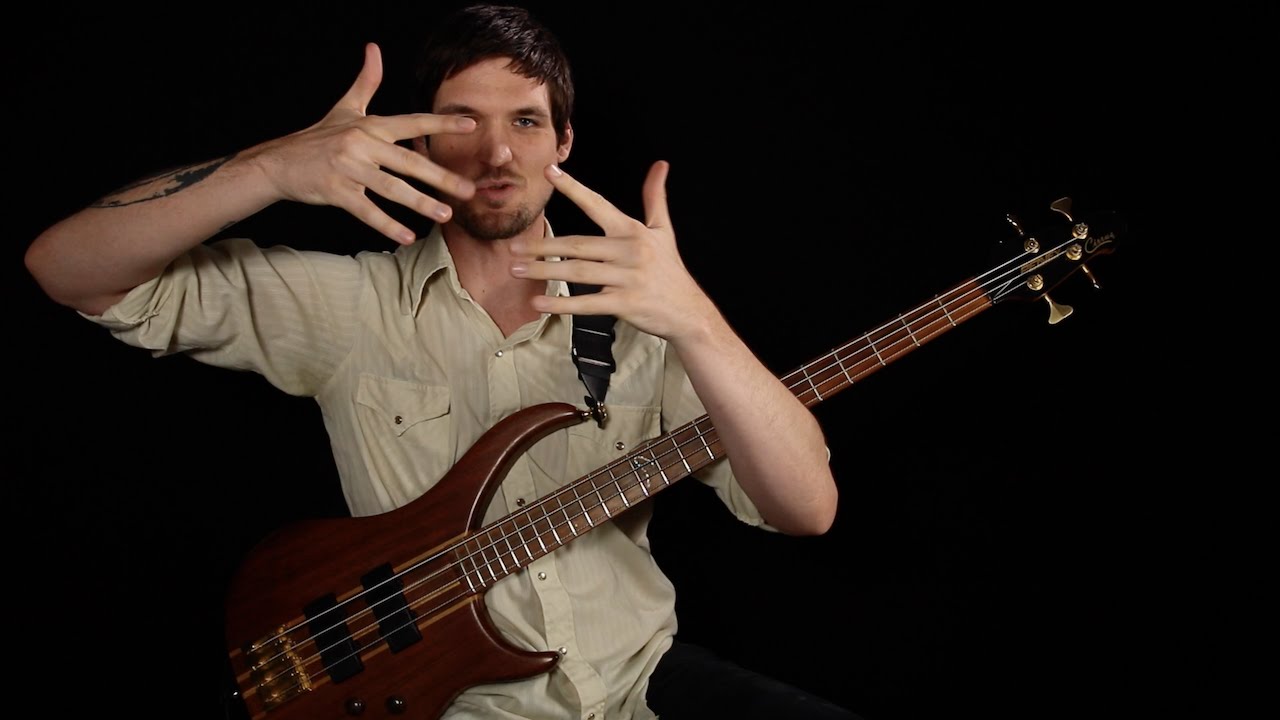 Vic Bass. Electric Bass finger. Bass player