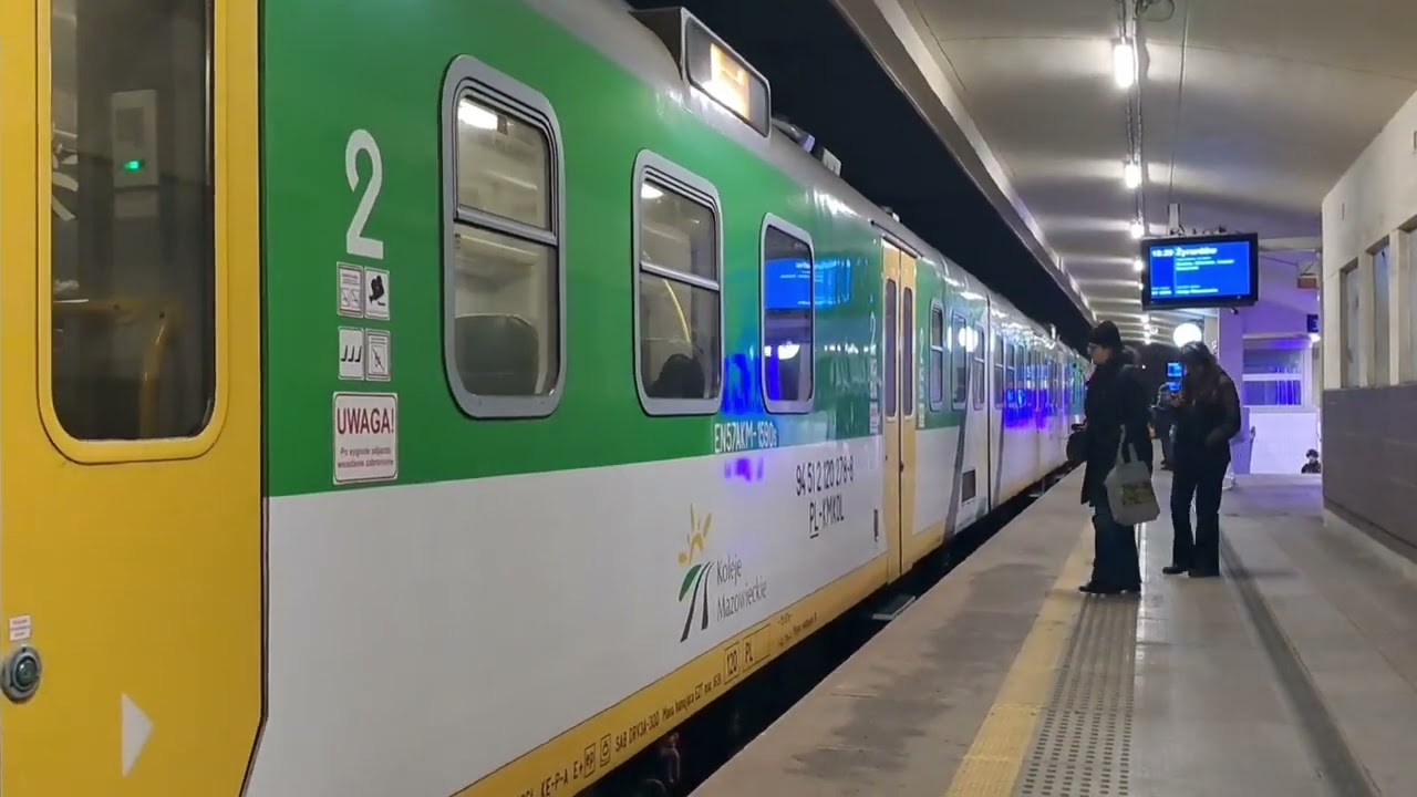 Електропоїзд EN57AKM-1590+1637 на ст. Pruszków