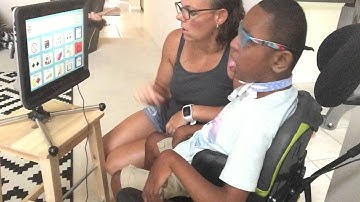 Mom modeling PODD on Tobii i15 eyegaze