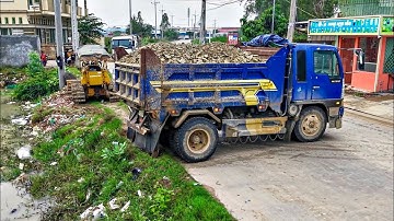Massive Flooded Landfill Transformed ! Dump Truck Unloading Stone with Komat