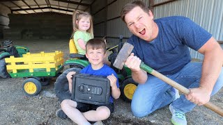 Using kids tractors to open mystery safe on the farm | Tractors for kids