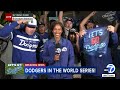 Fans celebrate the Dodgers NLCS sweep over the Brewers