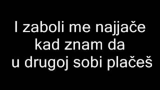 Miniatura de "Željko Joksimović - Leđa o leđa tekst lyrics"