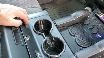 MYCON PRESENTER handgun lockbox in center console deploying