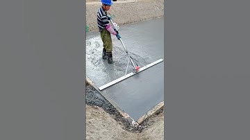 Leveling process of concrete pavement with handheld leveler