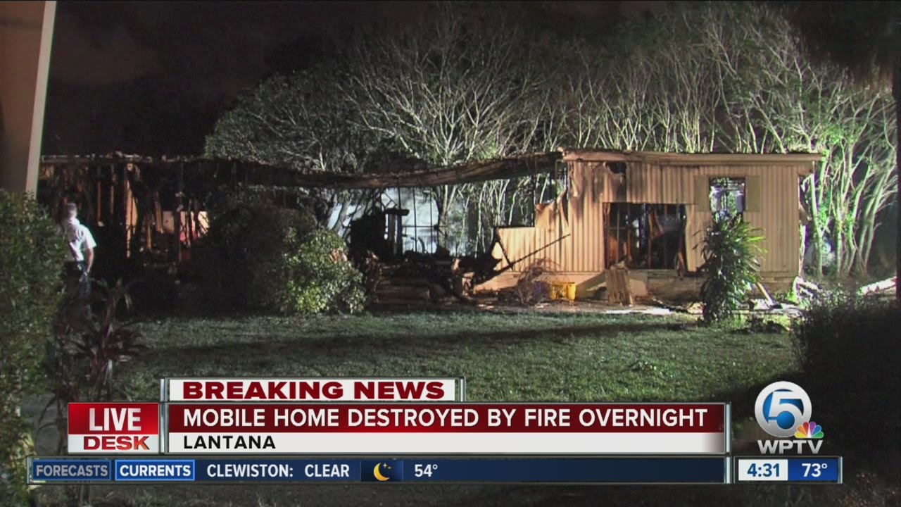 Fire destroys mobile home - YouTube