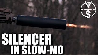 Physics of a Suppressor in Slow Motion