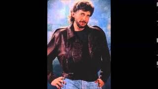 Watch Eddie Rabbitt Rockin With My Baby video