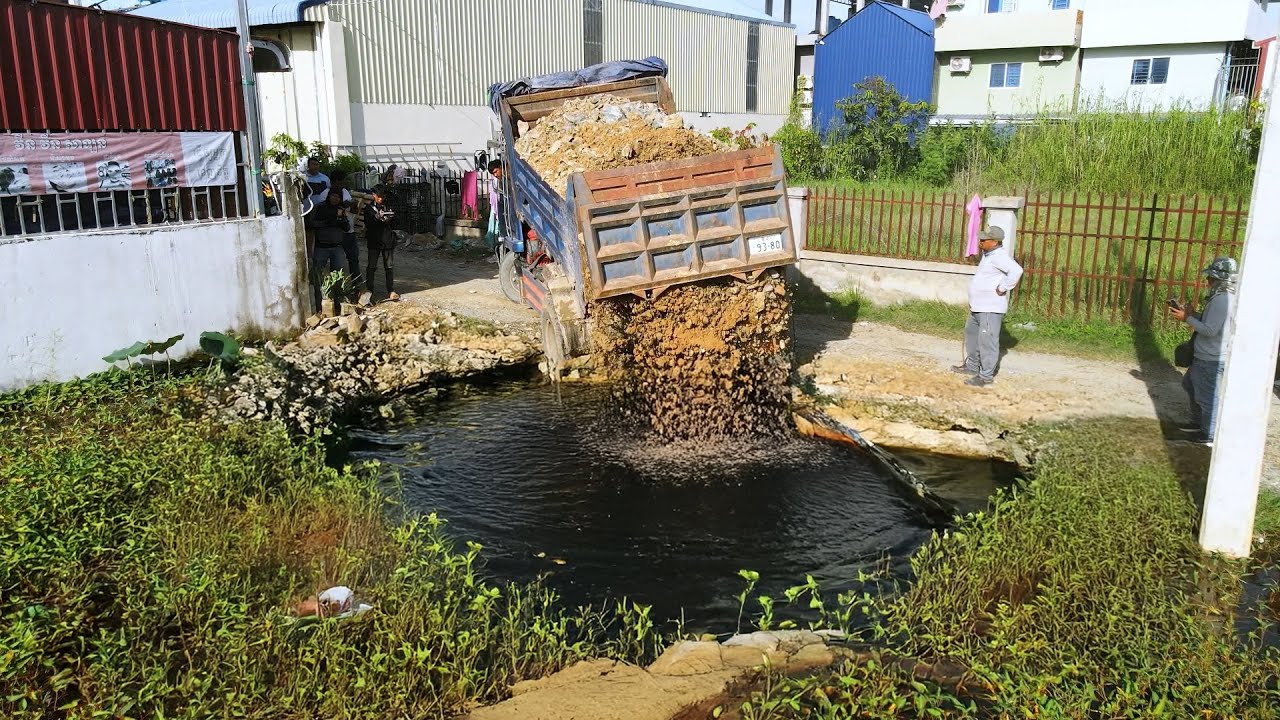 NEW Landfill Project: Dump Truck Dumping Rock Into Deep pond ...