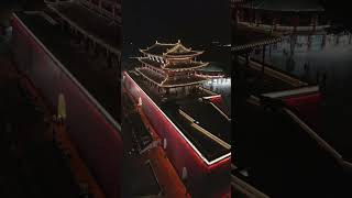 'Eternal Cyclist: Nighttime DJI Mini Flight above Jianshui China Gate stunning view!'