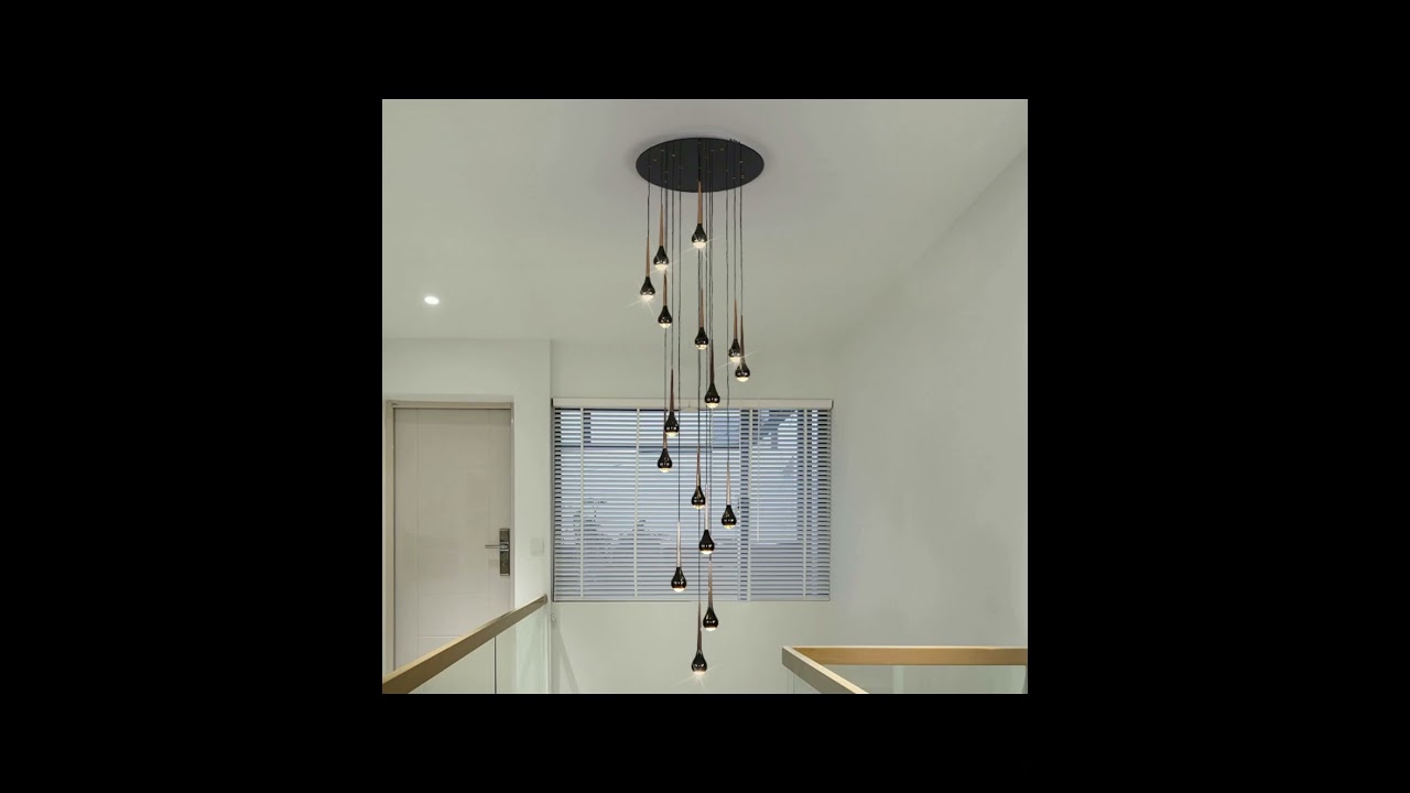 Stair long chandelier light luxury loft rotating lamps.