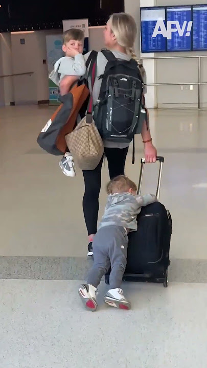 Kid on Trolley Bag: Hilarious Ride Pulled by Mom! #funny_videos #comedy #funny #fun #happiness #joy