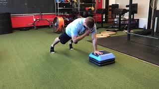 Offset Push-Up into Shoulder Tap