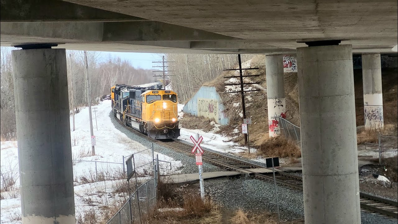 ONR 113 passing under the Trout lake overpass with units ONR 2103 leading, ONR 2124, and ONR 2123