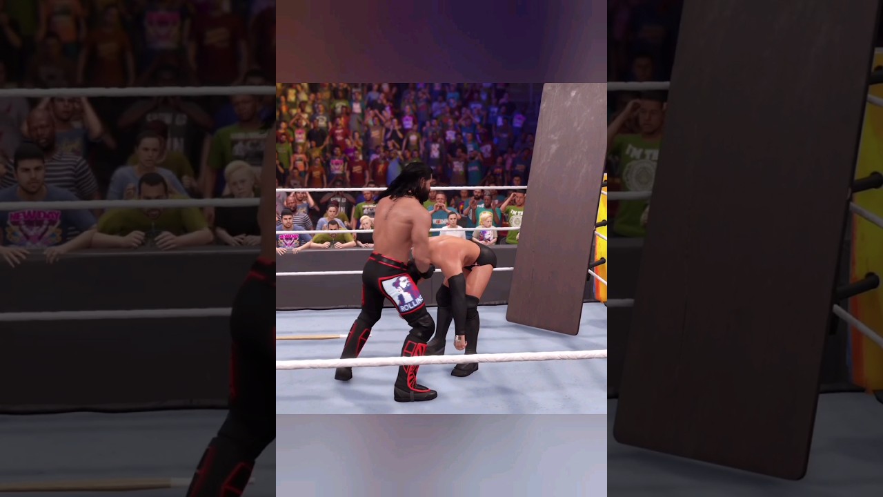 WWE 2K22 Seth Rollins hits a thunderous buckle bomb through a table