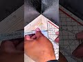 Marking a precise measurement on a wooden board using a metal square for an accurate cut