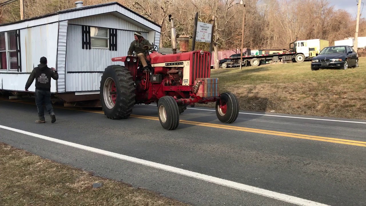 moving travel trailer with tractor