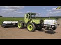 Traktor MB Trac 1000 &amp; Feldspritze gezielte Unkrautbekämpfung in Zwiebeln - KI in der Landwirtschaft