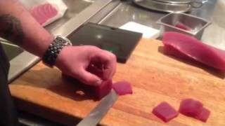 Cutting sashimi from saku blocks