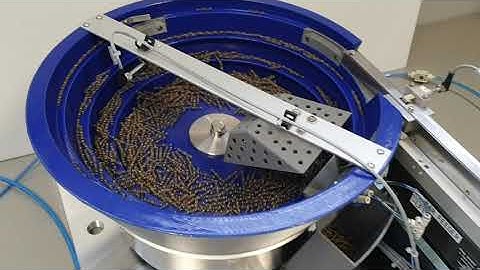 Feeding system for metal springs with separator