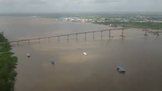 Aerial Overview Of The Suriname River Bridge Over It