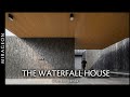 House in the city that creates an environment with a private waterfall  the waterfall house