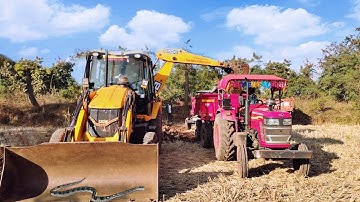 New Jcb 3Dx Backhoe Machine Loading Red Mud In Mahindra yuvo 575 Di tractor | tractor videos