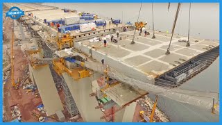Modern Suspension Bridge & Asphalt Road Construction Technology. Construction Equipment Machines