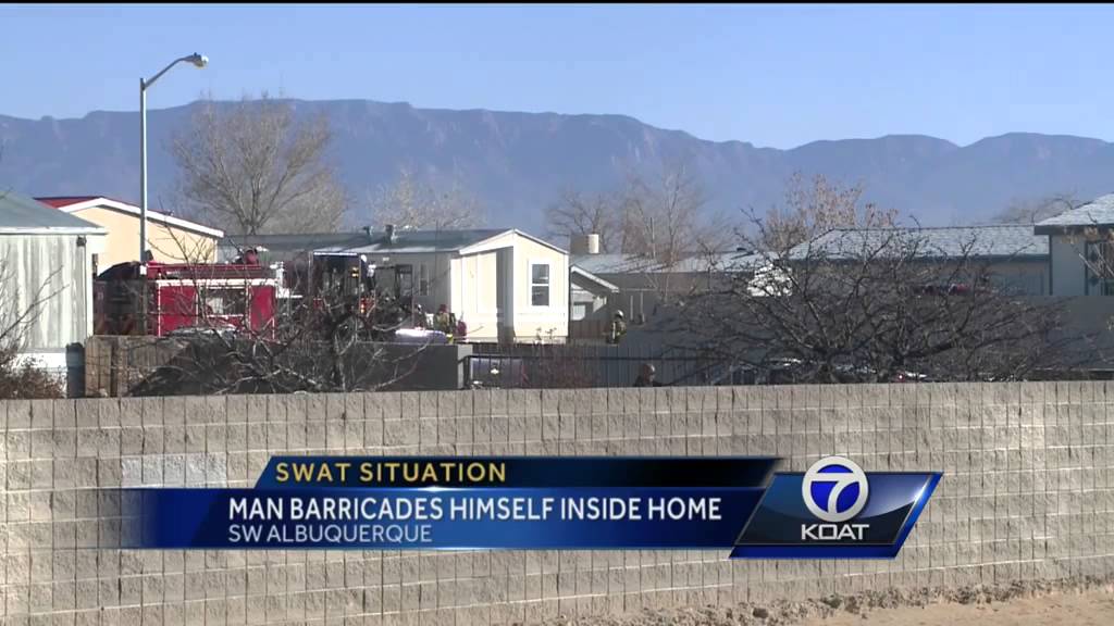 Man barricades himself inside home - YouTube