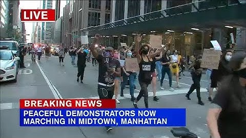 Peaceful protesters march through midtown