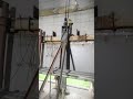 This is a real internal construction view of a large above-ground fixed roof storage tank.