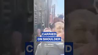 Freed Palestinian prisoner carries other on shoulders