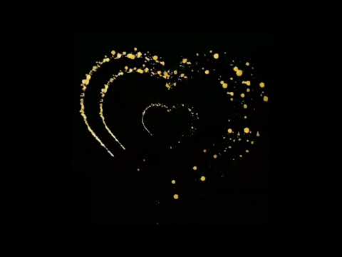       خلفية سوداء مع قلب ذهبي مضيء